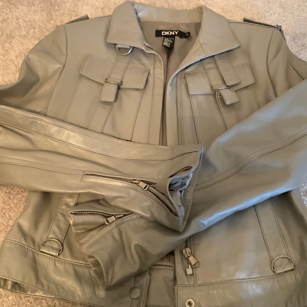Beautiful soft silver DKNY leather jacket. Like new condition.